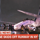 Pence’s plane being boarded by emergency crews. (Image: MSNBC Screengrab)
